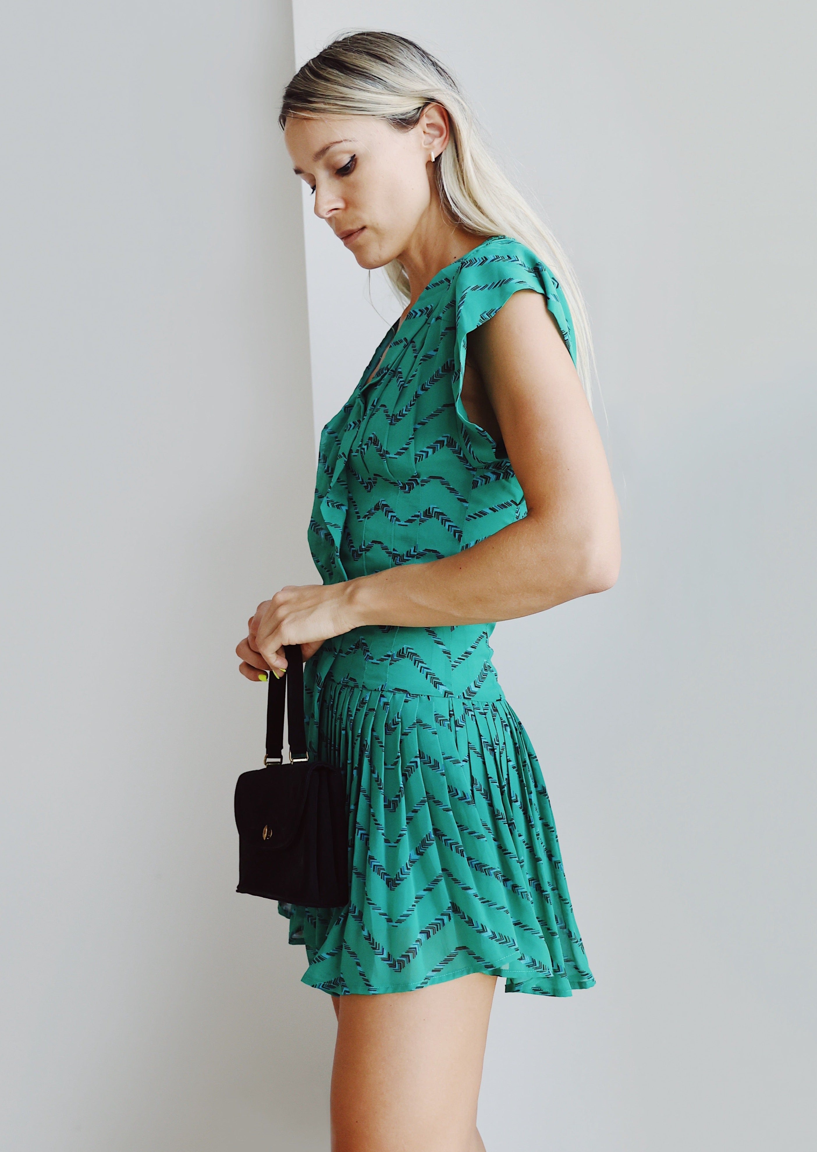 Green Pleaded Mini Dress by Chelsea & Violet